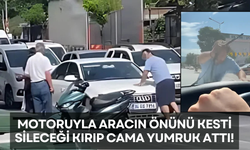 Aracın sileceklerini kırıp, cama yumruk attı!
