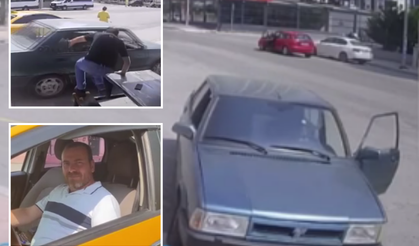 Kahraman taksici el freni çekilmeyen otomobile camdan daldı!